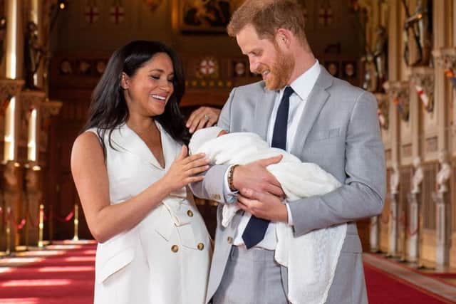 The Duke and Duchess of Sussex with their baby son, who was born in May. Picture: PA