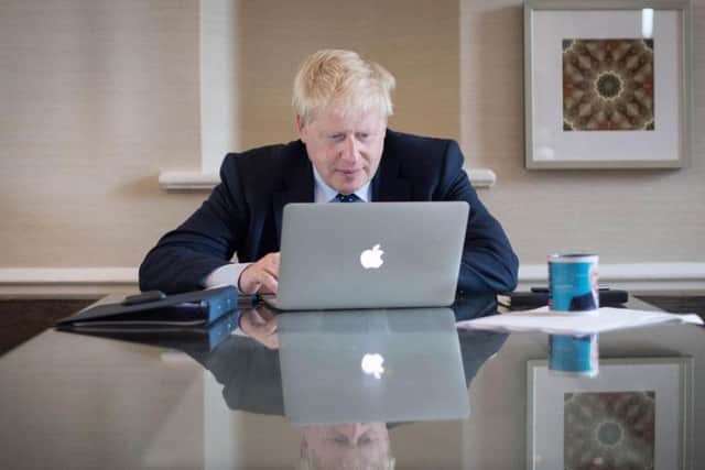 Prime Minister Boris Johnson works on his speech for the Conservative Party conference