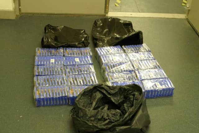 Officers suspected the van was overweight, and when they looked inside, they found 50g pouches of hand-rolled tobacco, which had no markings of UK duty being paid. Picture: SWNS