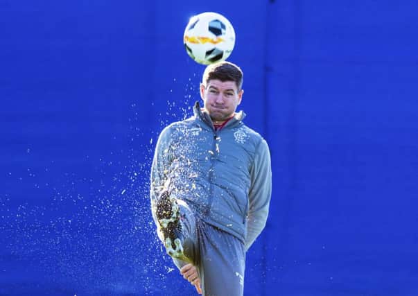 Rangers manager Steven Gerrard gets involved in training yesterday before flying out to Switzerland. Picture: Alan Harvey/SNS