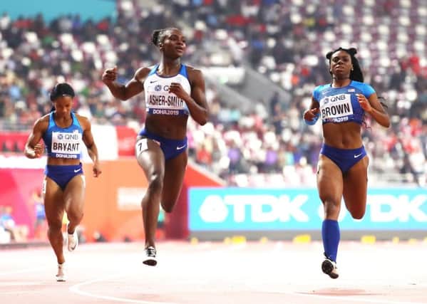 Dina Asher-Smith crosses the finish line in the 200m final. Picture: Matthias Hangst/Getty