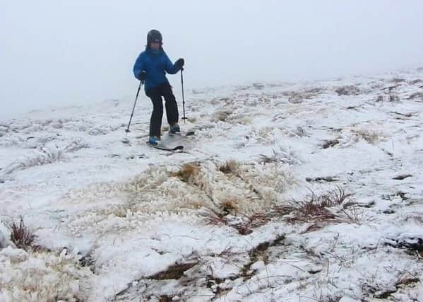Helen Rennie skiing in "shrubby" conditions on Cairn Gorm,  2 Oct 2019