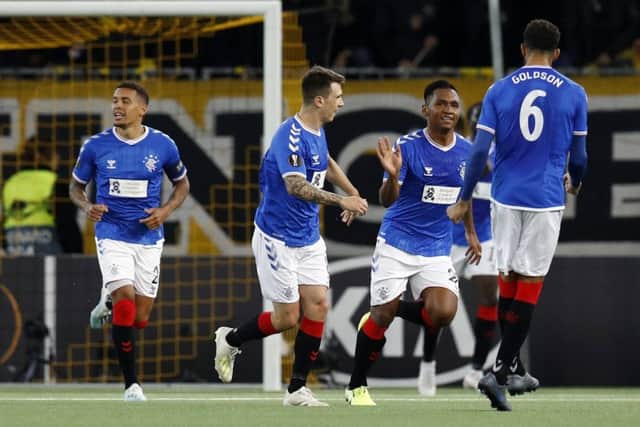 Rangers striker Alfredo Morelos celebrates with his team-mates after scoring the first goal of the game against Young Boys. Picture: Peter Klaunzer/Keystone via AP