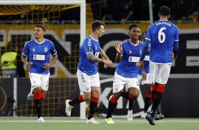 Rangers striker Alfredo Morelos celebrates with his team-mates after scoring the first goal of the game against Young Boys. Picture: Peter Klaunzer/Keystone via AP
