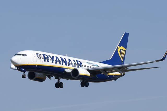 A Ryanair flight comes in to land