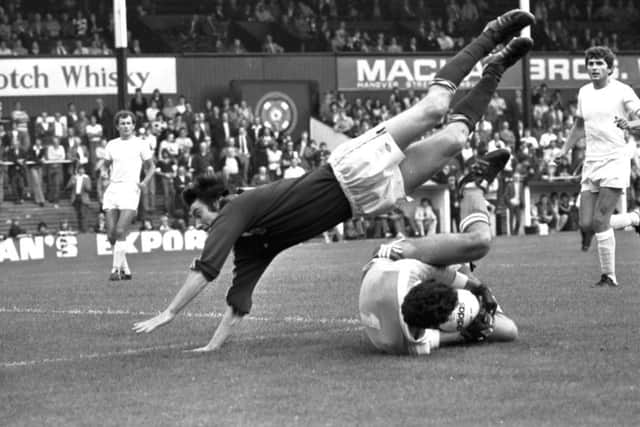 Rab Prentice is foiled by the OFK Kikinda goalkeeper during a match at Tynecastle in Augus 1977