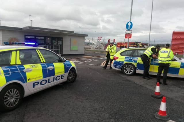 Emergency service crews are attending to a KLM aircraft from Amsterdam. Picture: TSPL