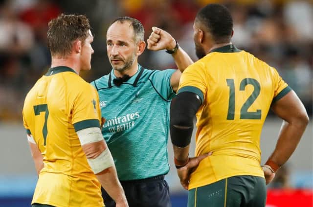 Australia centre Samu Kerevi, right, was controversially penalised against Wales. Picture: Odd Andersen/AFP/Getty Images