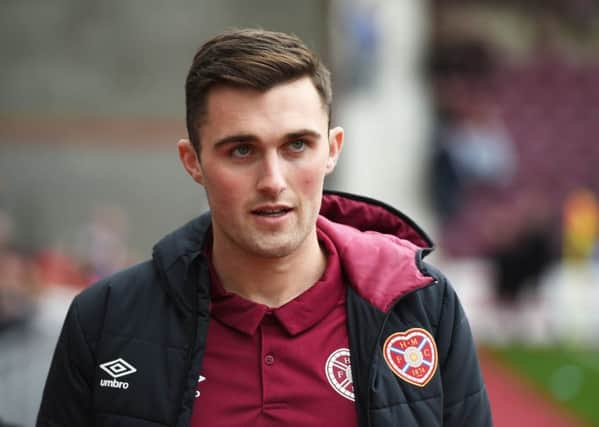 Hearts' John Souttar was injured againsst Aberdeen in the first league game of the season. Picture: Ross MacDonald/SNS