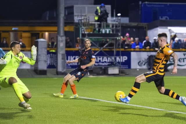 Kevin O'Hara scores the winning goal for Alloa. Picture: SNS.