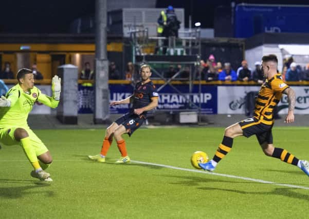 Kevin O'Hara scores the winning goal for Alloa. Picture: SNS.