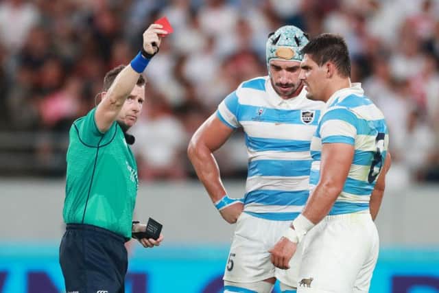 Nigel Owens shows Pumas lock Tomas Lavanini a straight red for his high tackle on England's Owen Farrell in Tokyo earlier today. Picture: Getty Images