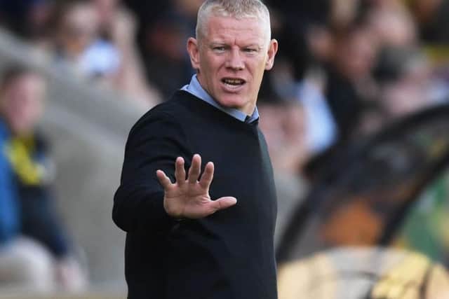 Gary Holt on the touchline for Livingston.