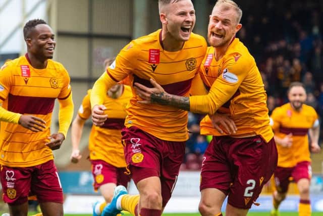 James Scott celebrates his goal for Motherwell.