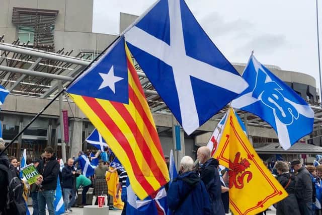 The Catalan flag was flown alongside the Saltire to show solidarity. Picture: Lisa Ferguson