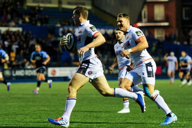 Mark Bennett runs in a try in Edinburgh's victory at Cardiff Arms Park. Picture: Ryan Hiscott/INPHO/Shutterstock