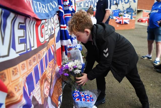 Ricksen's brother Pedrosaid:We went to Ibrox to see all the scarves and shirts outside."