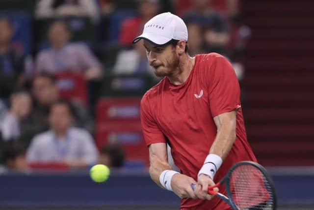 Andy Murray plays a backhand against Juan Ignacio Londero in Shanghai.