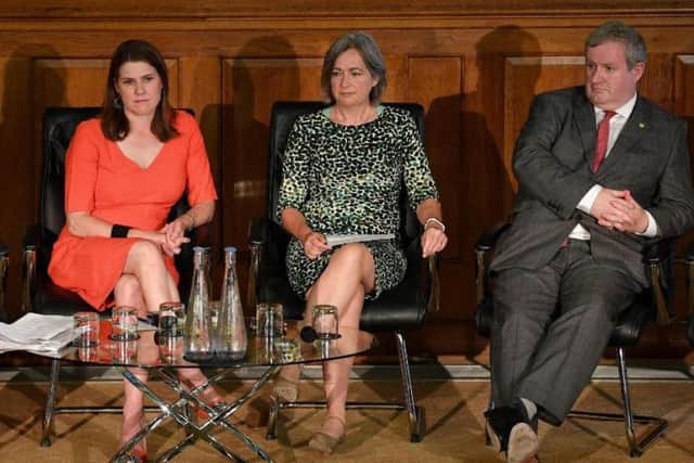 Liberal Democrat leader Jo Swinson (left) and SNP leader Ian Blackford (right) are at odds over tactics to stop a no-deal Brexit