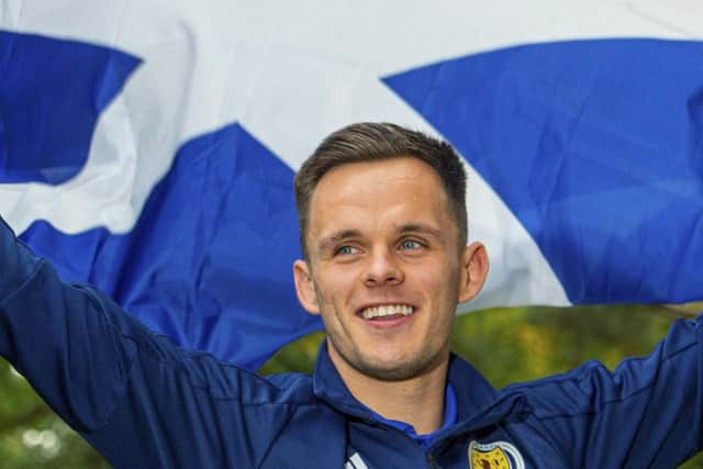 Lawrence Shankland flies the flag at a Scotland media session at the Oriam ahead of the Euro 2020 qualifying double-header. Picture: Bill Murray/SNS