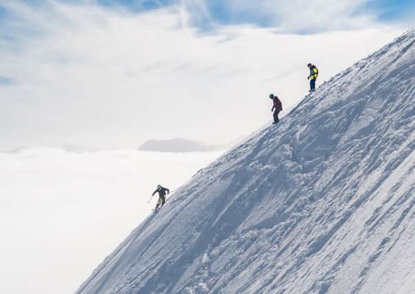 A group of skiers and snowbaords tackling the Flypaper at Glencoe Mountain Resort. SkiScotland /Steven McKenna