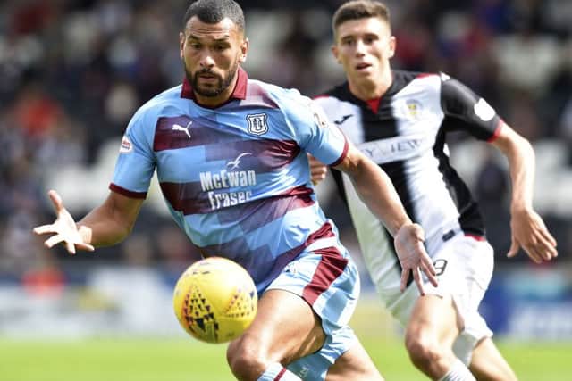 Steven Caulker had a spell at Dundee last year. Picture: SNS