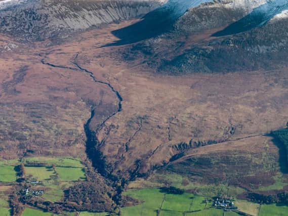 An aerial photo of the Isle of Arran, where new technology has revealed 1,000 previously unknown ancient sites. PIC: Historic Environment Scotland.