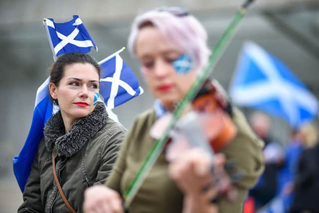 The All Under One Banner march in Edinburgh had musical accompaniment (Picture: Jeff J Mitchell/Getty Images)