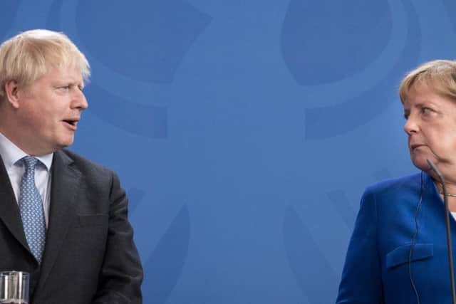 Boris Johnson and German Chancellor Angela Merkel have not always seen eye to eye. Picture: Stefan Rousseau/PA Wire