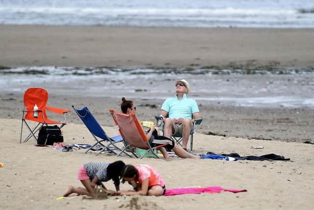 People hit Portobello Beach on 25 July - the hottest day of the year