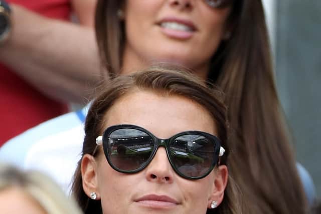 Coleen Rooney (front) with Rebekah Vardy seated behind