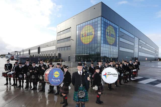 The North Lanarkshire Schools Pipe Band helped launch the Lidl base in Eurocentral. Picture: Contributed