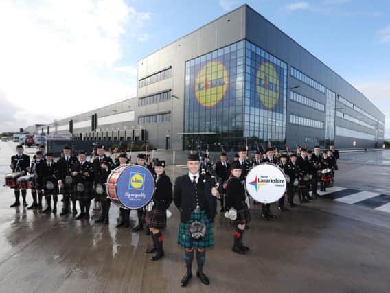 The North Lanarkshire Schools Pipe Band helped launch the Lidl base in Eurocentral. Picture: Contributed