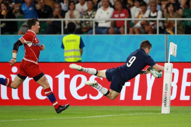 George Horne dives over for Scotland's seventh try against Russia. Picture Adam Pretty/Getty Images