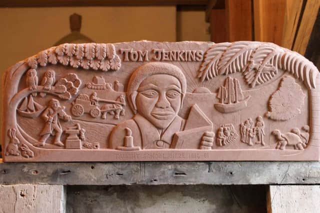 A commemorative lintel in the old smithy charts the life of Tom Jenkins ( The Johnnie Armstrong Gallery).