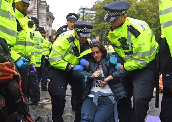 Protesters have faced arrest during the protests. Picture: Victoria Jones/PA Wire
