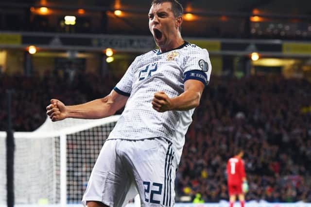 Russia captain Artem Dzyuba celebrates scoring at Hampden back in September in his country's 2-1 win over Scotland. Picture: Craig Williamson/SNS