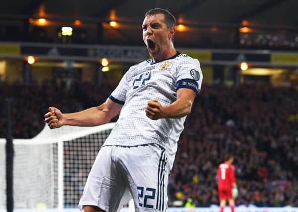 Russia captain Artem Dzyuba celebrates scoring at Hampden back in September in his country's 2-1 win over Scotland. Picture: Craig Williamson/SNS