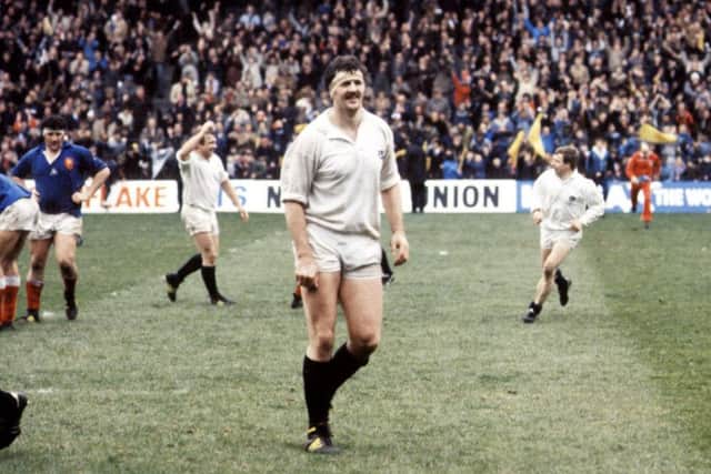 Jubilant scenes at Murrayfield in 1984, with lock Alan Tomes in the foreground, as Scotland are confirmed Grand Slam winners in 1984 following victory over France. Picture: SNS