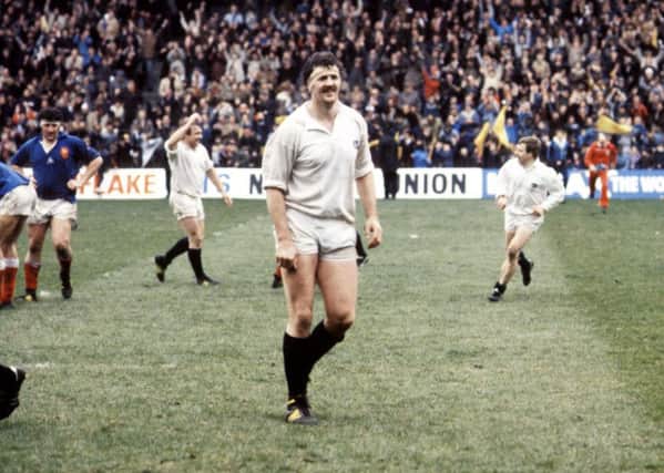 Jubilant scenes at Murrayfield in 1984, with lock Alan Tomes in the foreground, as Scotland are confirmed Grand Slam winners in 1984 following victory over France. Picture: SNS