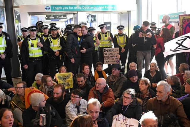 Protesters at the airport. Picture: PA