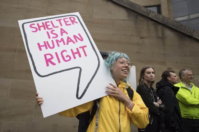 Campaigners gather in Glasgow to protest the proposed eviction of asylum seekers in the city in July 2018. Picture: John Devlin