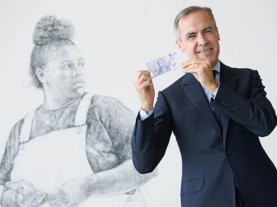 Bank of England government Mark Carney with the new 20 pound note