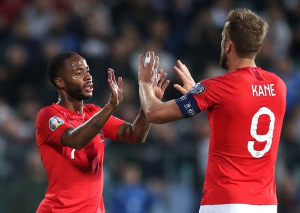 Raheem Sterling and Harry Kane celebrate in a match marred by racist abuse from Bulgarian fans (Picture: Nick Potts/PA Wire)