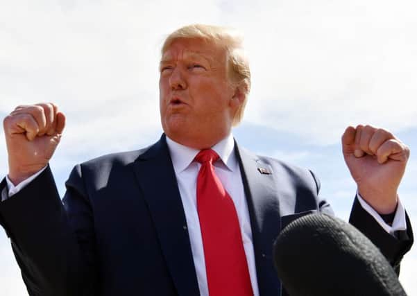 Donald Trump surprised the grieving family of teenager Harry Dunn by saying the American woman suspected of being involved in the road accident that caused his death was in the next room (Picture: Nicholas Kamm/AFP via Getty Images)