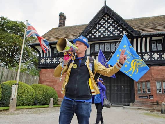 An anti-Brexit protester outside Thornton Manor