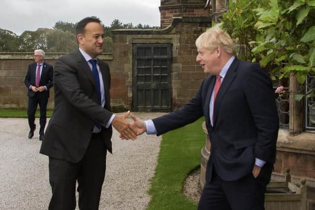 The two leaders shake hands outside Thornton Manor