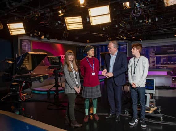 Some of the students with MD of broadcasting at STV, Bobby Hain, in the news studios. Picture: Contributed