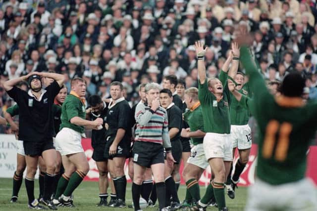 Springboks captain Francois Pienaar celebrates as referee Ed Morrison blows the full time in the 1995 Rugby World Cup final at Ellis Park in Johannesburg. Picture: Mike Hewitt/Allsport/Getty Images