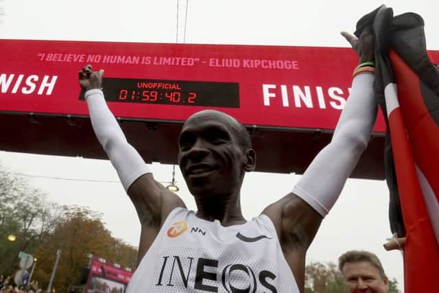 Marathon runner Eliud Kipchoge from Kenya celebrates his historic feat. Pic: AP Photo/Ronald Zak